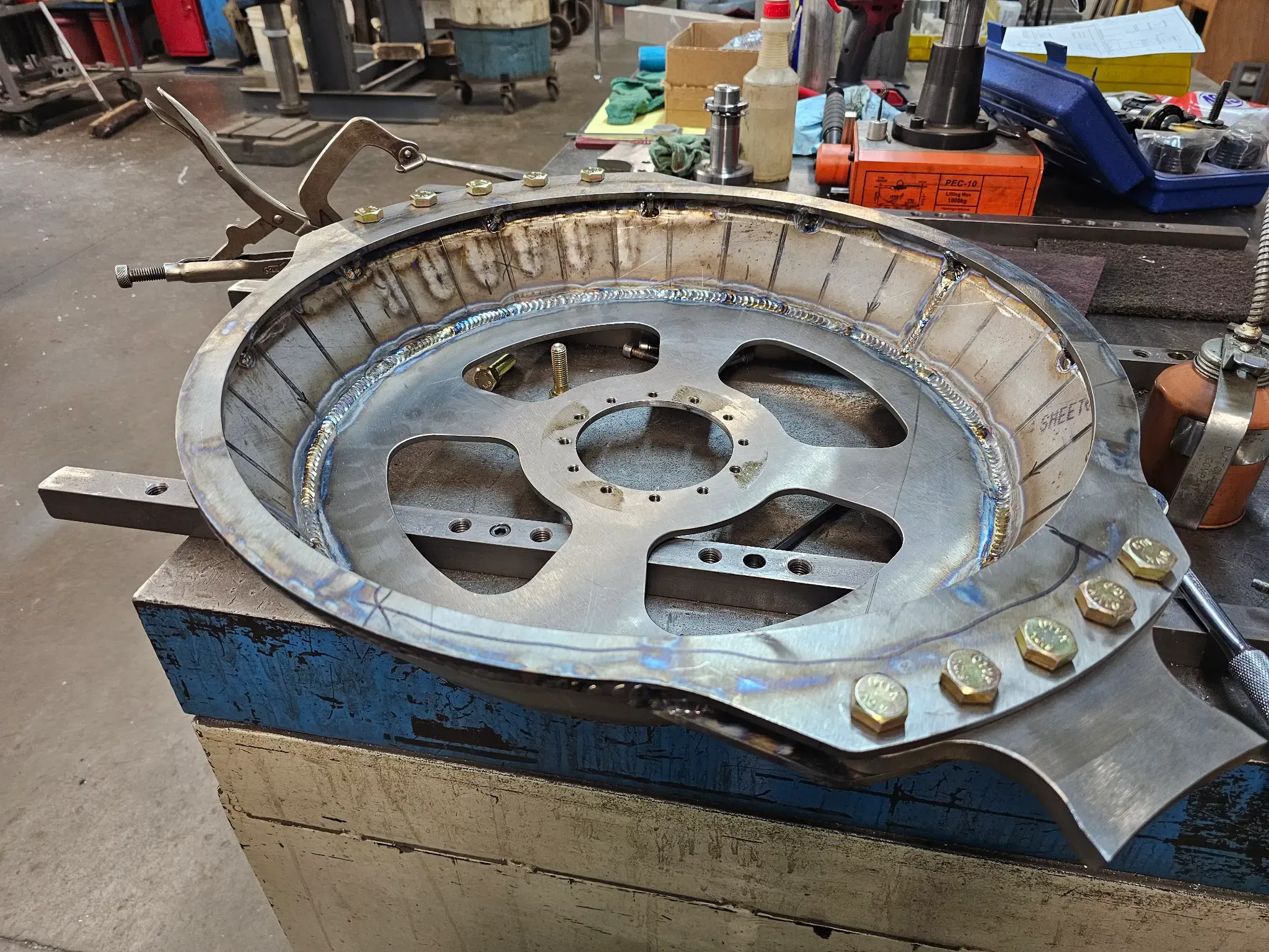 Machined weapon ring for a spinner